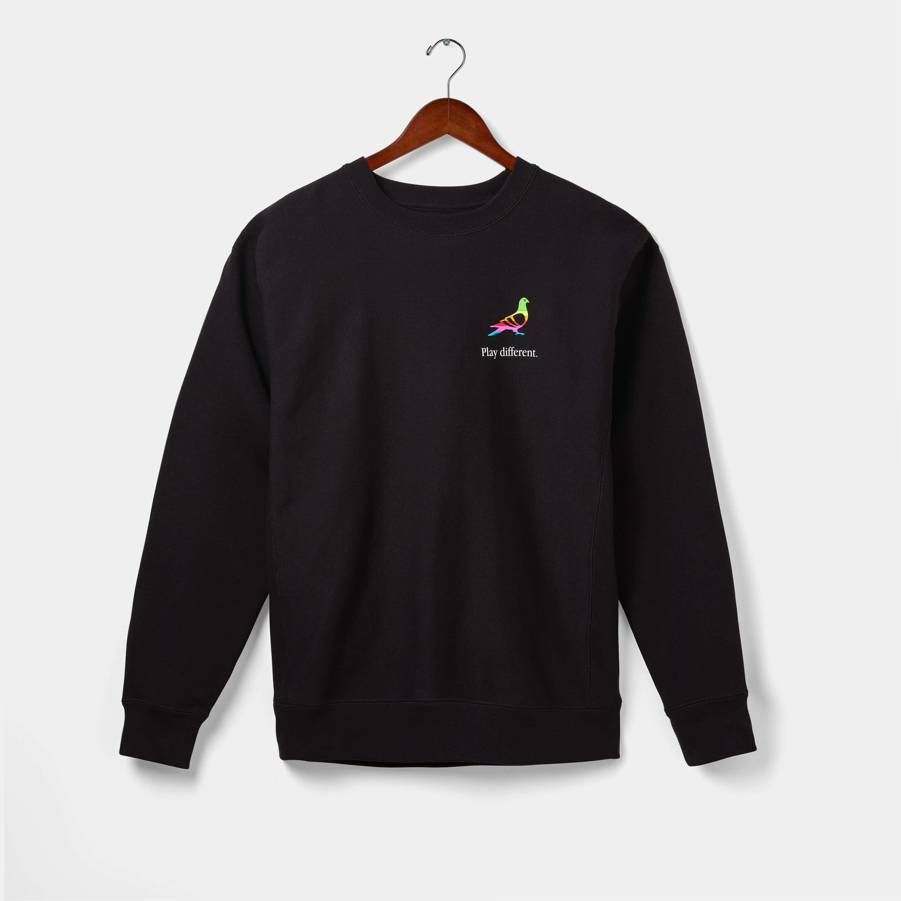 calle play different sweatshirt with a striped pigeon and the words "play different" silkscreened by hand on the front